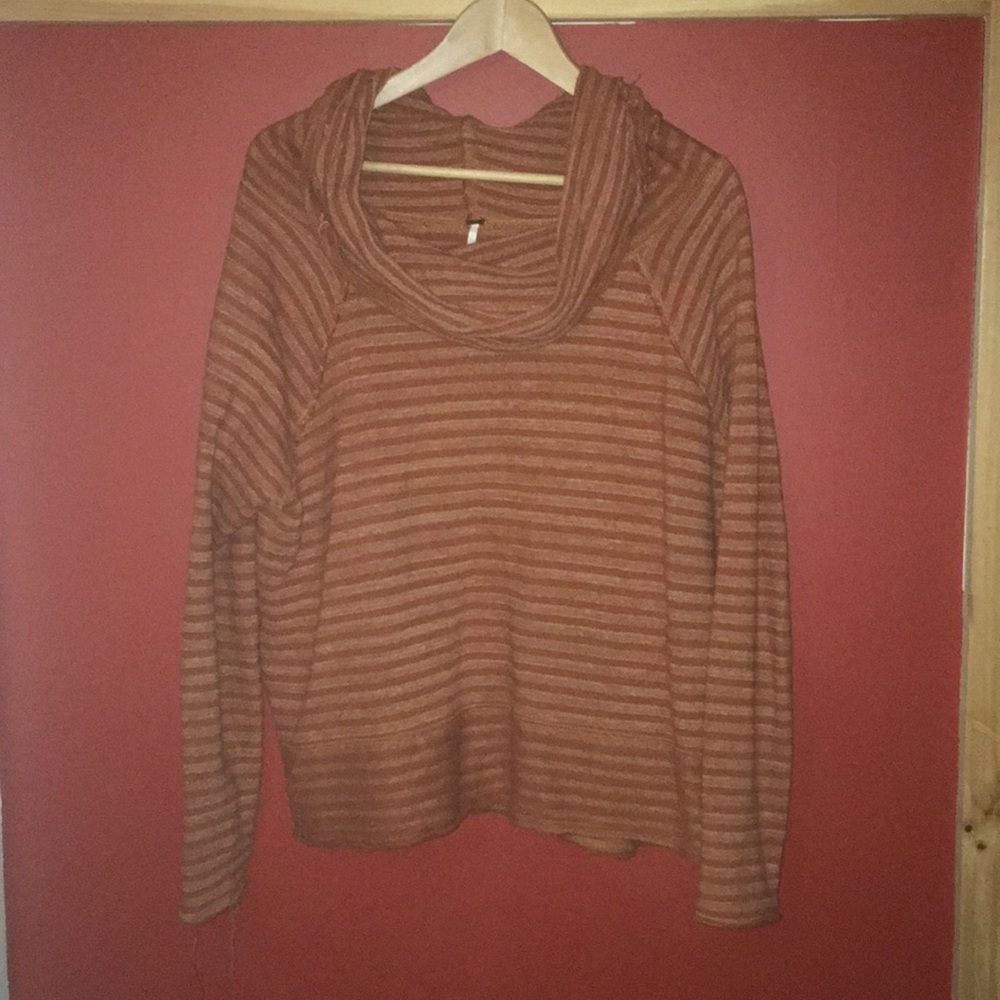Distressed reversed stitched cowl neck top